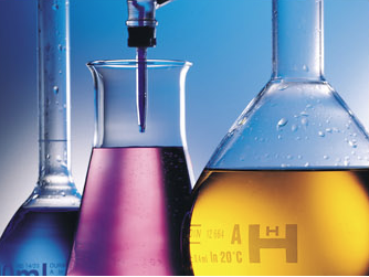 Test tubes with different coloured liquids.